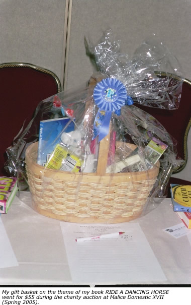 My gift basket on the theme of my book RIDE A DANCING HORSE went for $55 during the charity auction at Malice Domestic XVII (Spring 2005).